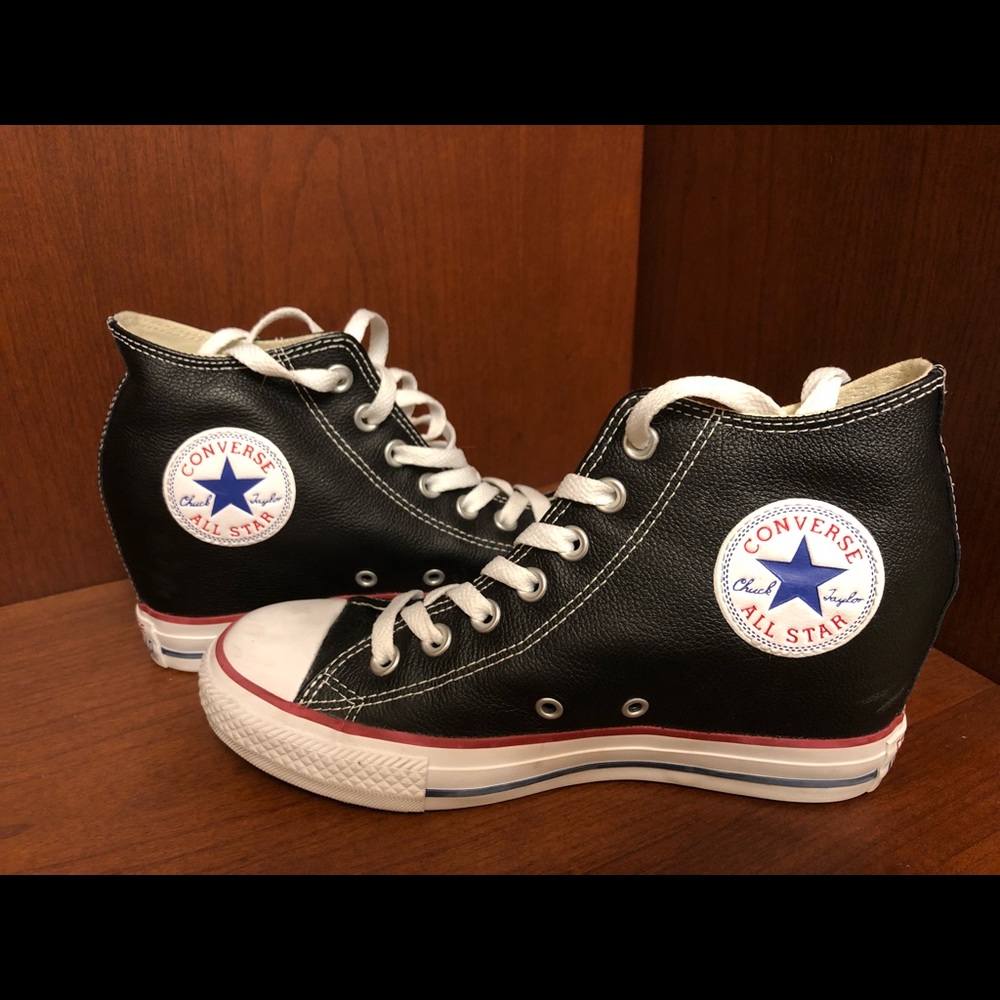 Converse black leather wedge shoes.